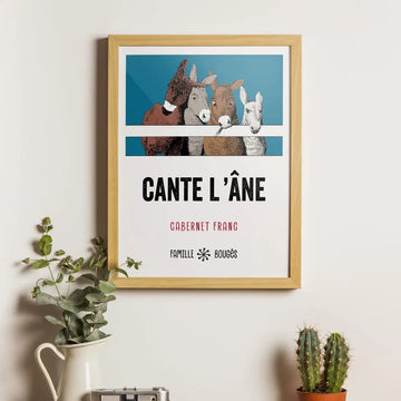 Mise en situation de l'affiche Cante l'Âne dans un cadre accroché au mur